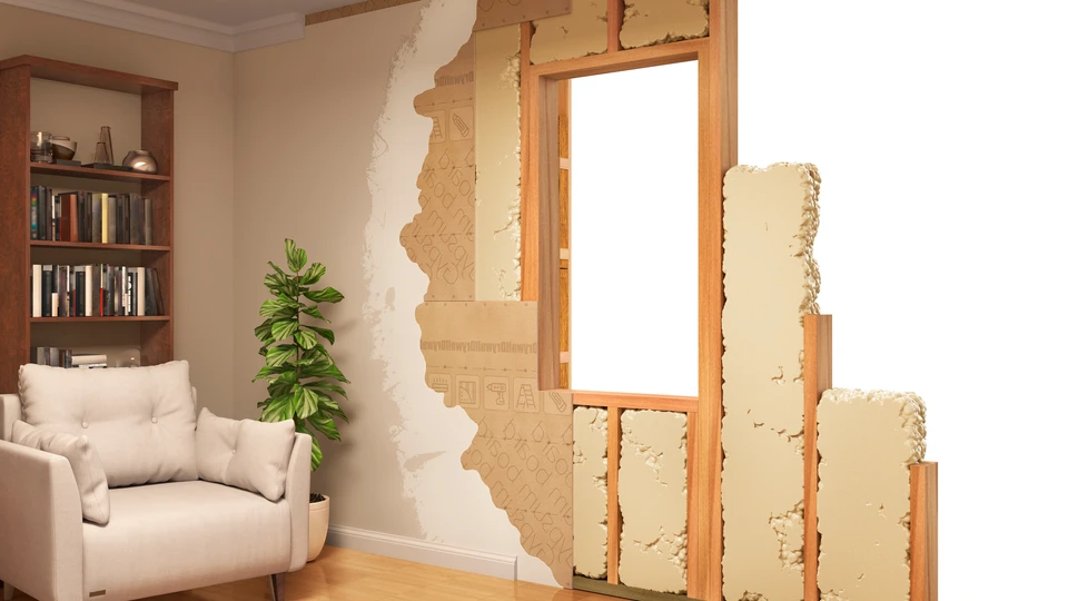 Atelier de menuiserie avec matériaux de construction superposés sur établi