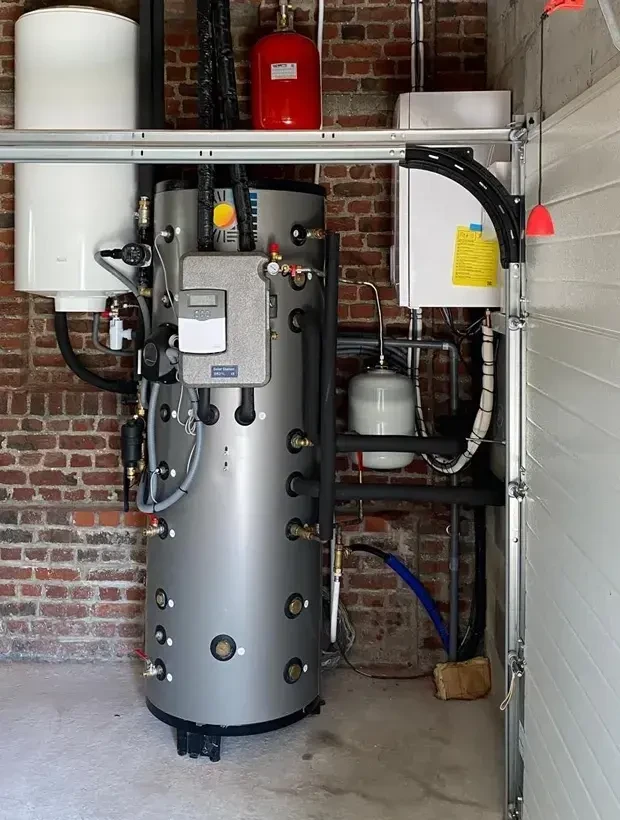 Sous-sol résidentiel aménagé avec installation de chauffage et production d'eau chaude sanitaire